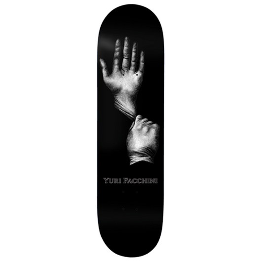 Skateboard deck with a black and white graphic of two hands on a white background