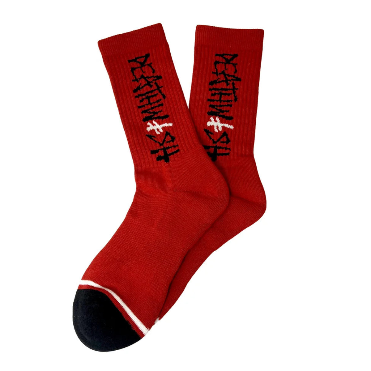 A pair of red crew socks with black gothic-style lettering on the cuffs and black toe caps, displayed against a solid white background.