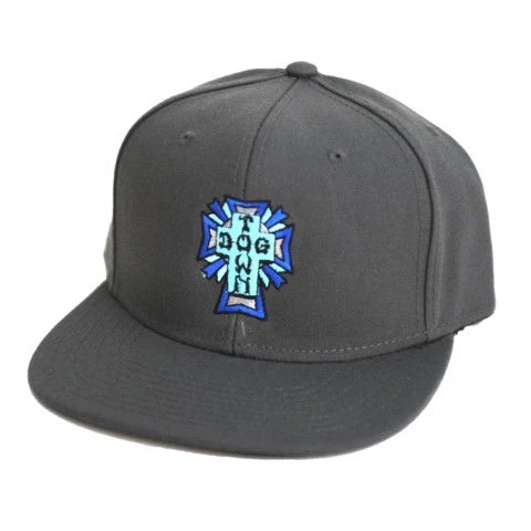 A dark gray flat-brim snapback cap featuring a blue and white graphic patch on the front with the text 'DOGTOWN'.