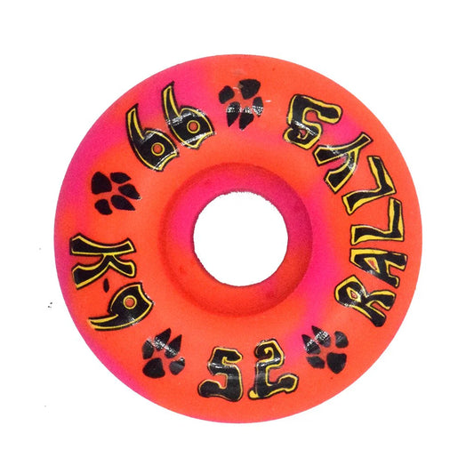 Orange skateboard wheel with black text and paw prints on a white background
