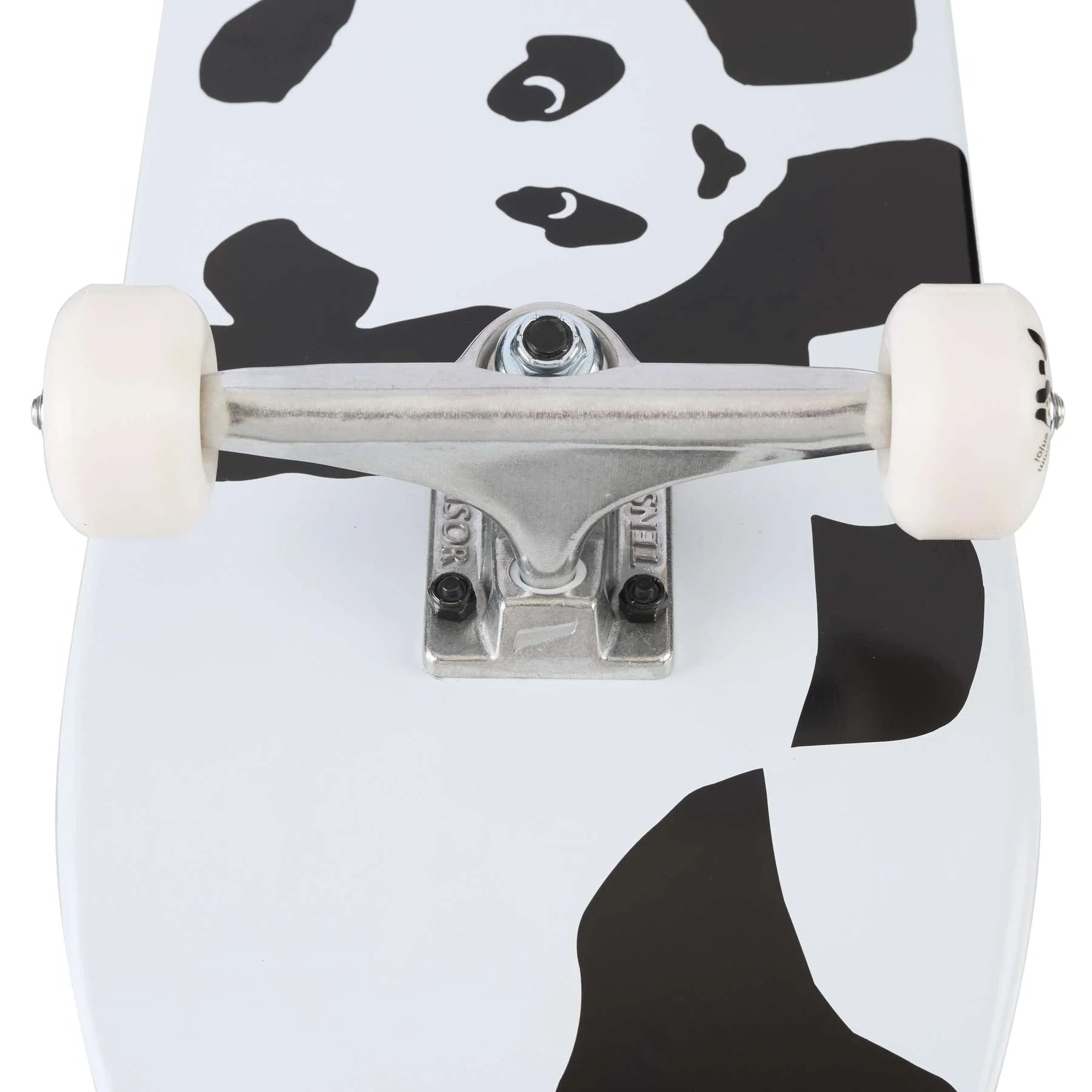 Skateboard with a cow print design on a white background