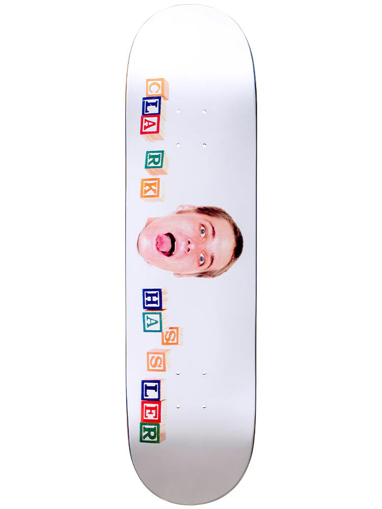 Skateboard deck with colorful text and a face on a white background