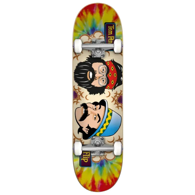 Skateboard deck with tie-dye design and cartoon characters on a white background