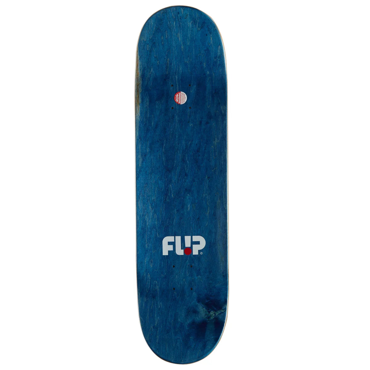 A blue wooden skateboard deck with a visible grain pattern, featuring the white and red FLIP logo near the bottom and a small red, white, and blue circular graphic near the top.
