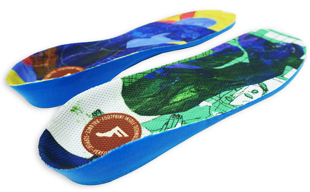 Colorful shoe insoles with a brand logo on a white background