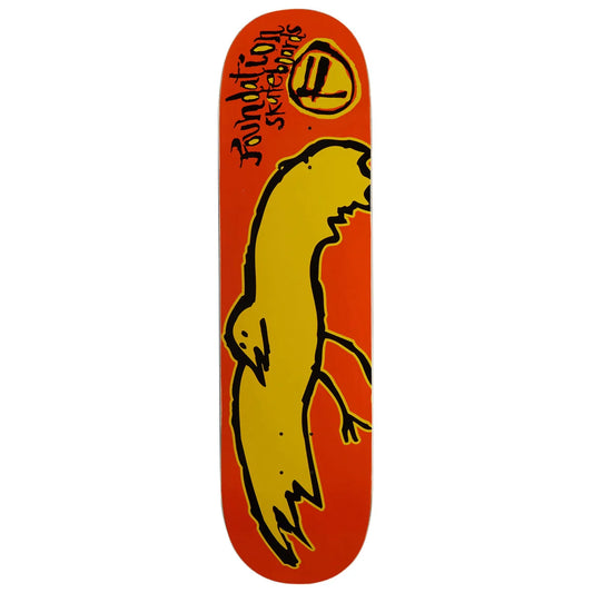 A skateboard deck featuring a bright orange background with a large yellow cartoon bird graphic and black text reading 'Foundation Skateboards' near the top.