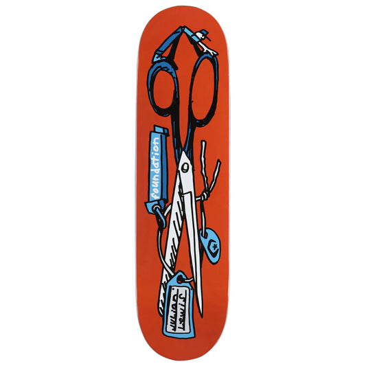 Skateboard deck with scissors design on an orange background