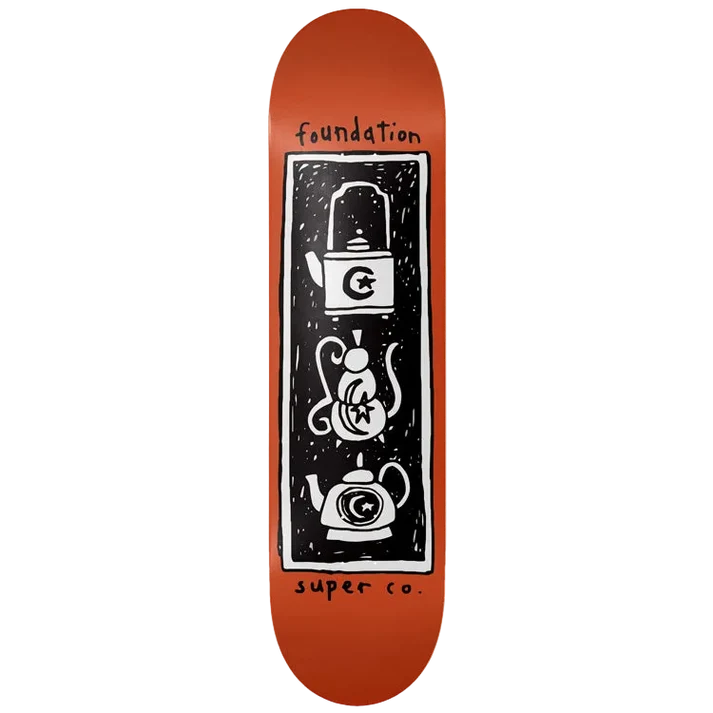An orange skateboard deck with a black and white graphic print featuring teapots and the words 'foundation' and 'super co.' on a plain white background.