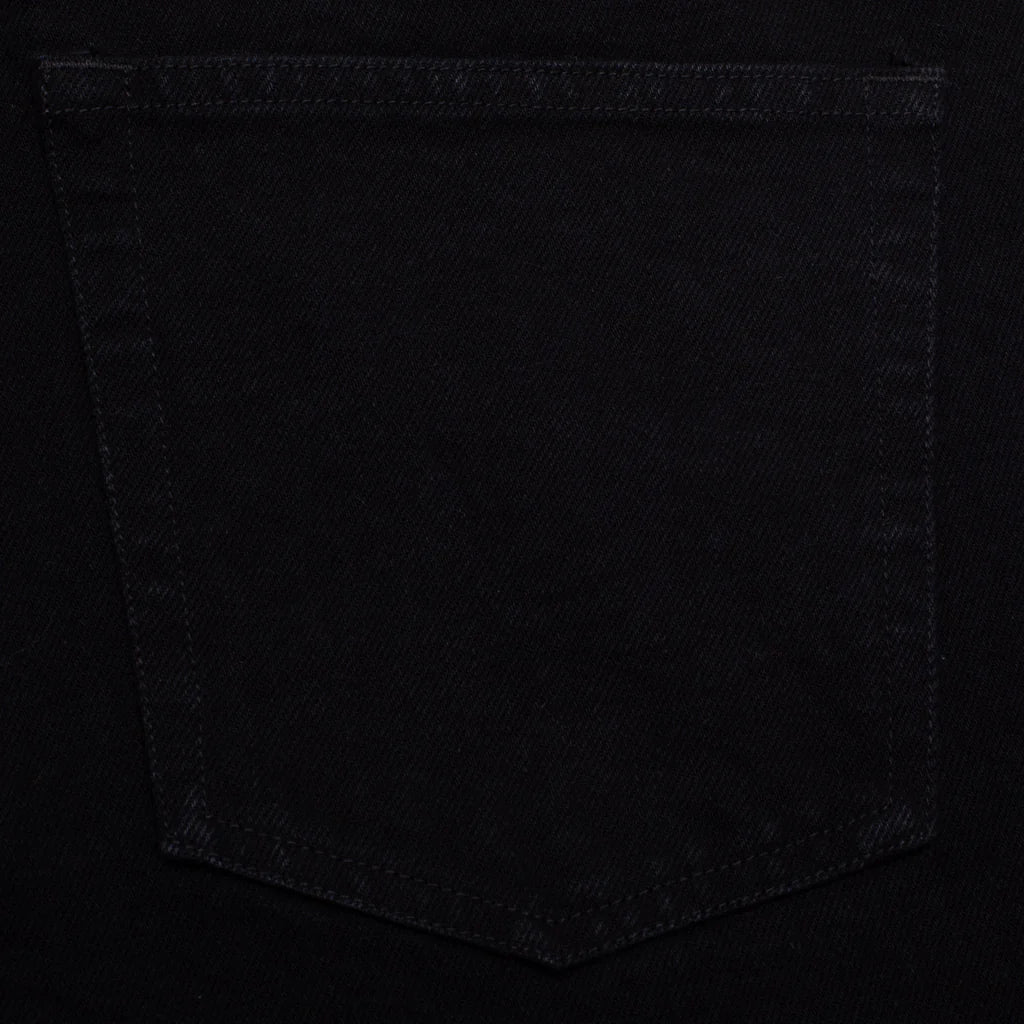 Close-up of a black pocket on a dark background