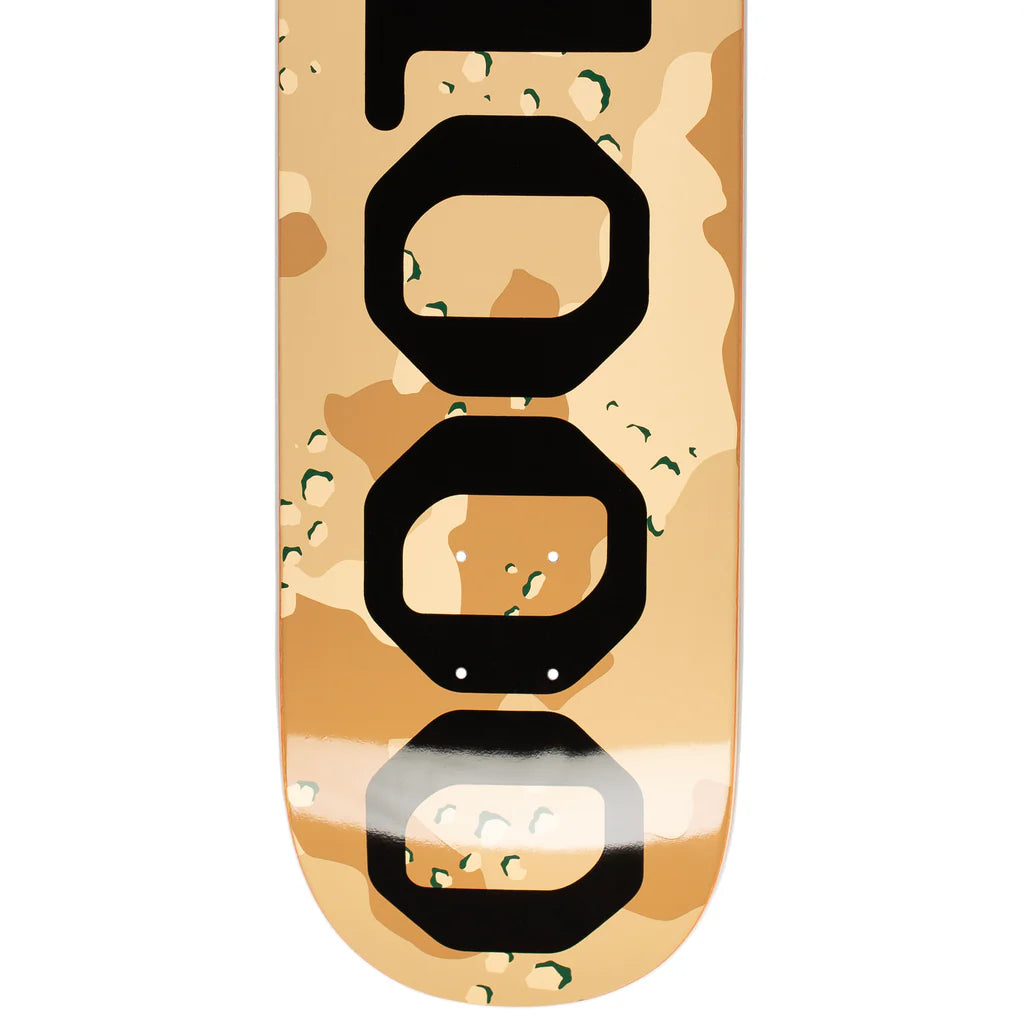 Skateboard deck with a camouflage pattern and black geometric shapes on a white background
