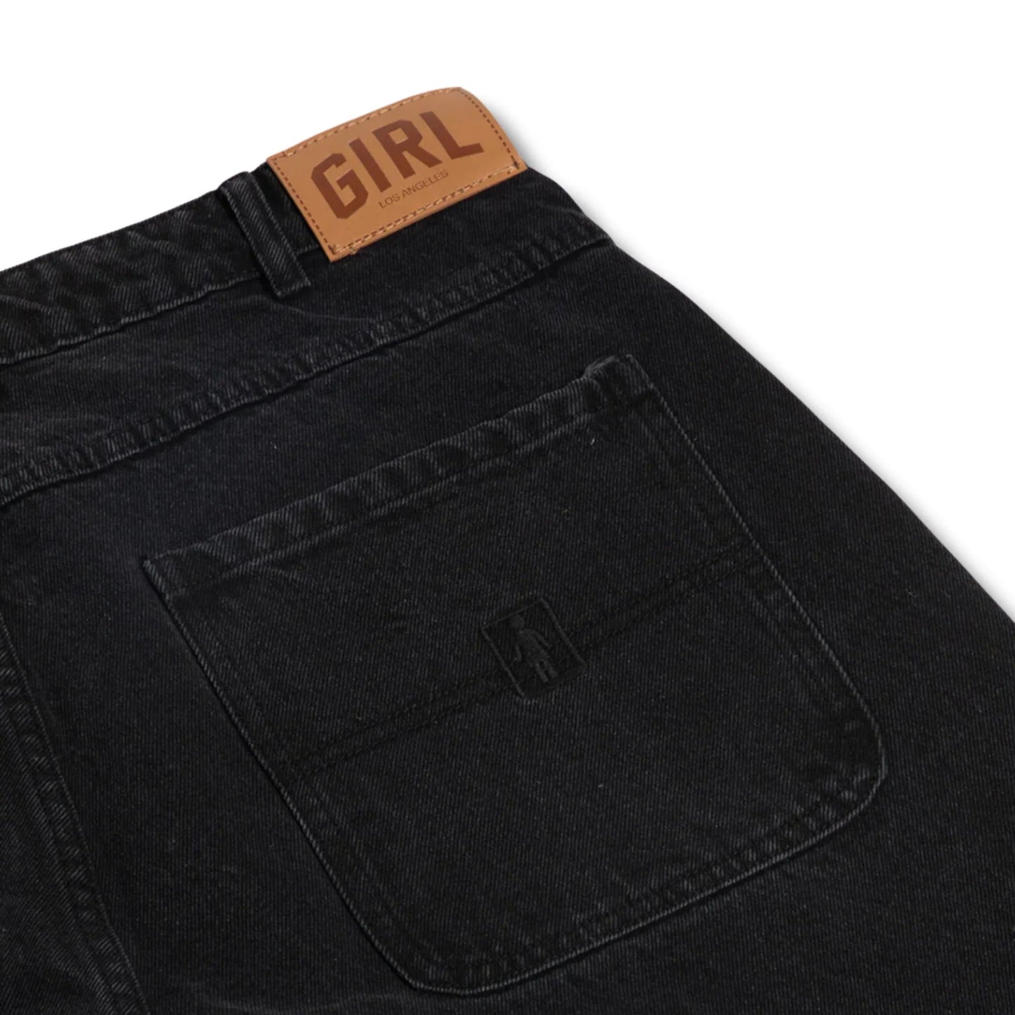 Black pants with a brown patch labeled 'GIRL' on a white background