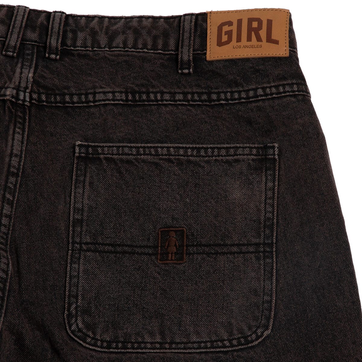 Brown denim shorts with a 'GIRL' brand label on the waistband.