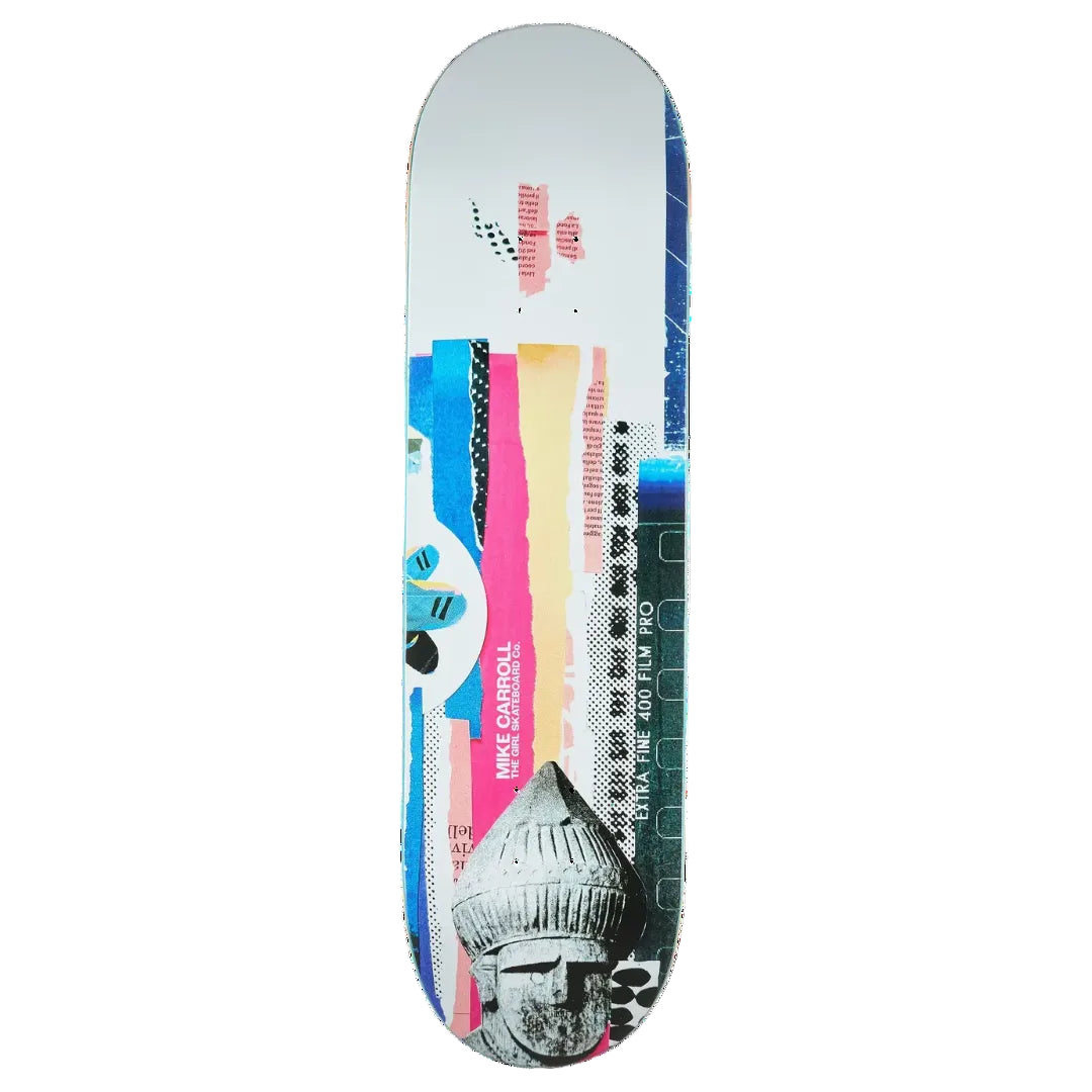 A skateboard deck featuring a colorful abstract collage design with pink, blue, yellow, and black graphic elements, a stylized face at the bottom.