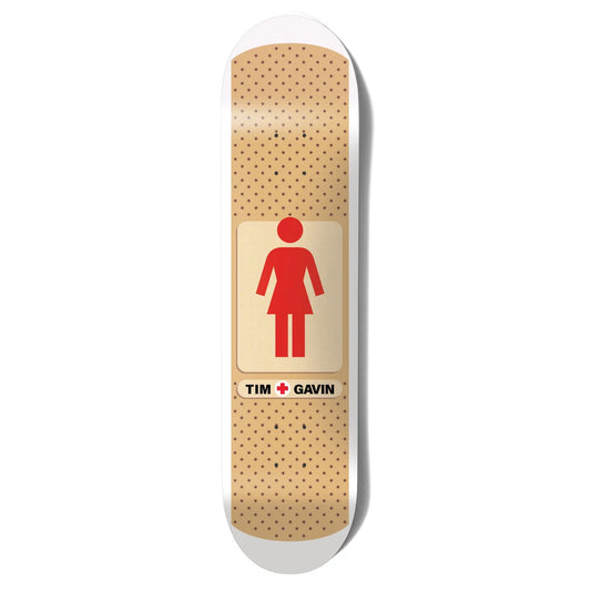 A skateboard deck featuring a parody band-aid graphic with a red female figure icon and the text 'TIM + GAVIN' on a beige band-aid design with black polka dots, shown on a white background.