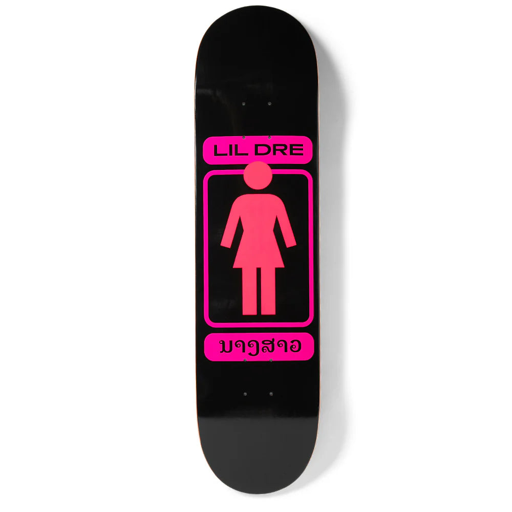 Skateboard deck with pink and black design on a white background