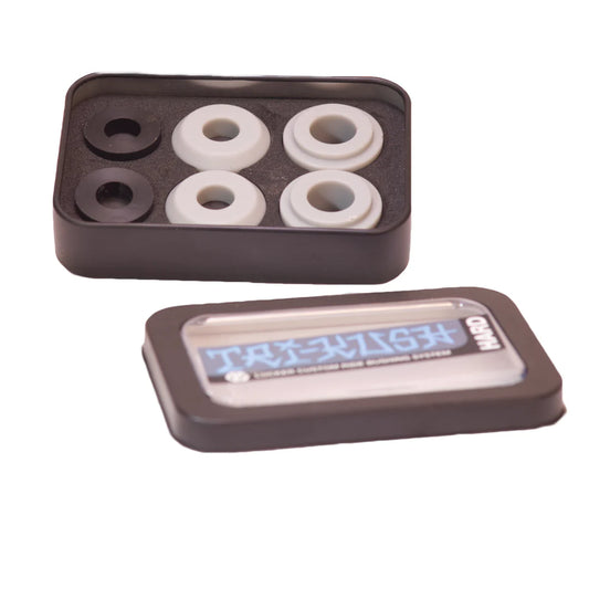 Set of skateboard bearings in a black plastic container on a white background