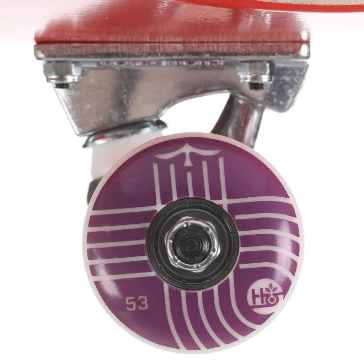 Close-up of a skateboard wheel with a purple design on a white background