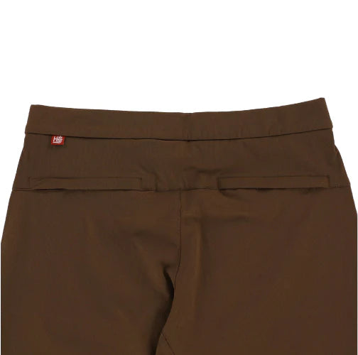 Brown pants with a visible brand label on a white background