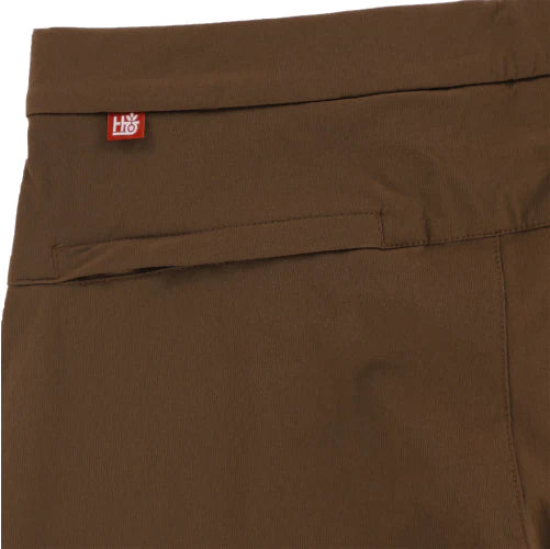 Brown pants with a red and white logo tag on the waistband.