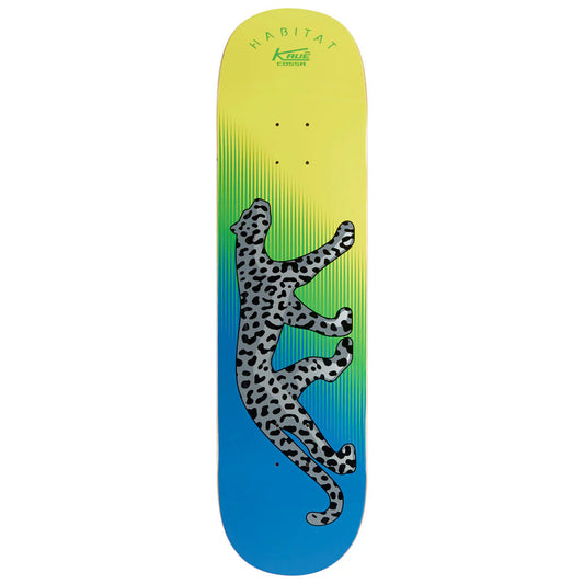 Skateboard deck with a leopard design and gradient yellow to blue color scheme on a white background.