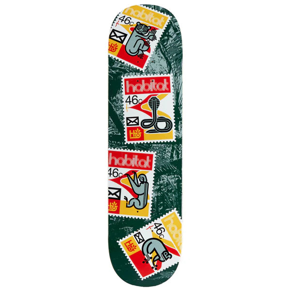 Skateboard deck with colorful graphics and 'habitat' branding on a white background