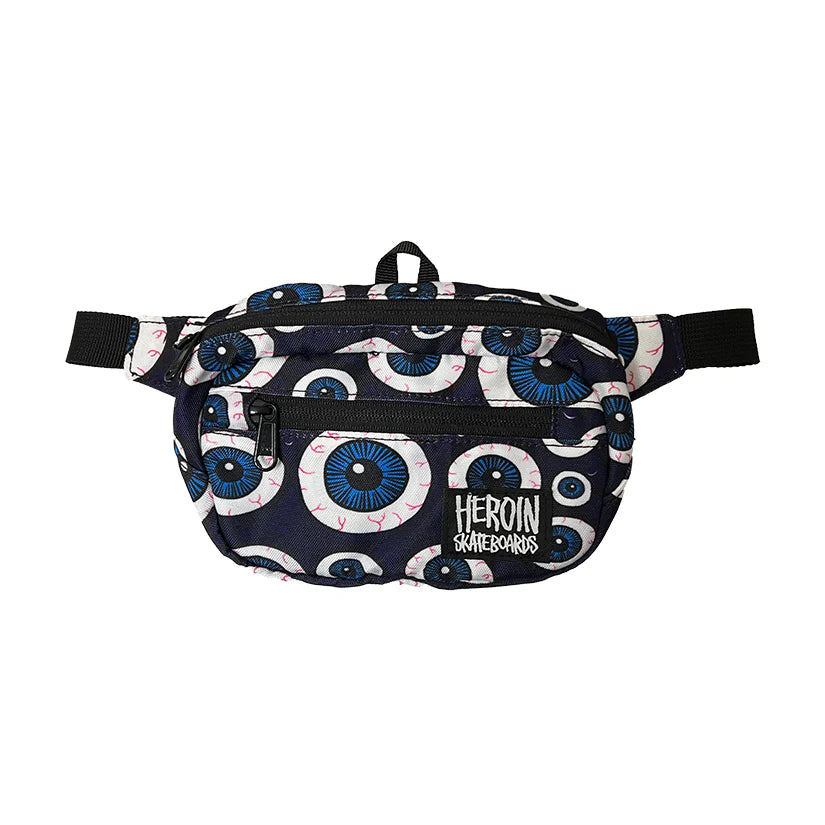 Fanny pack with eye pattern and 'Heroin Skateshabs' branding on a white background