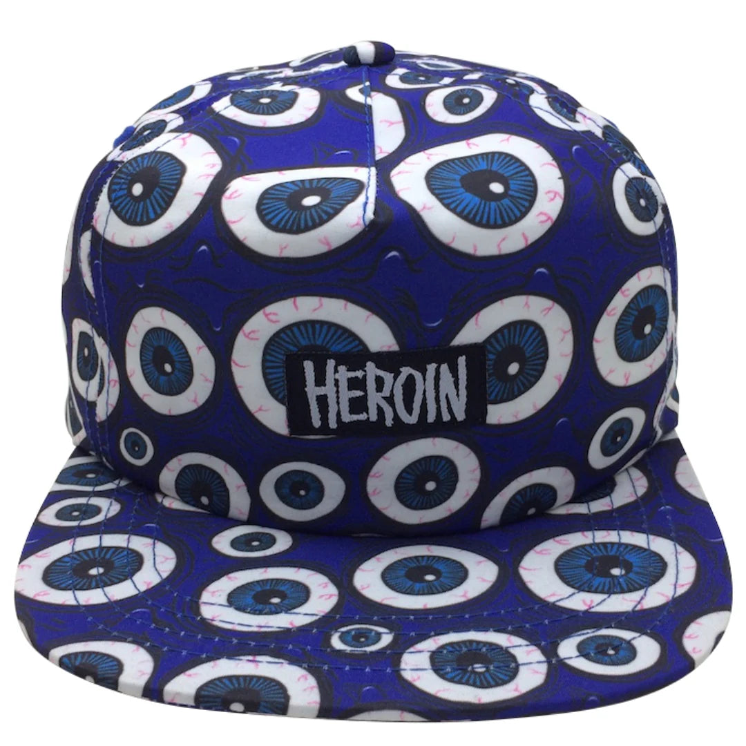 Blue cap with white and blue circular patterns and 'HEROIN' text on a white background