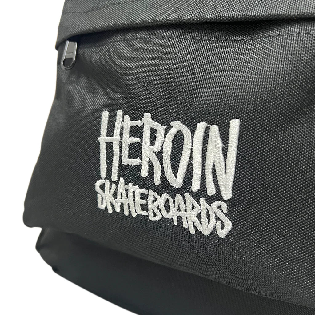Black bag with 'HEROIN SKATEBOARDS' text in white on a white background