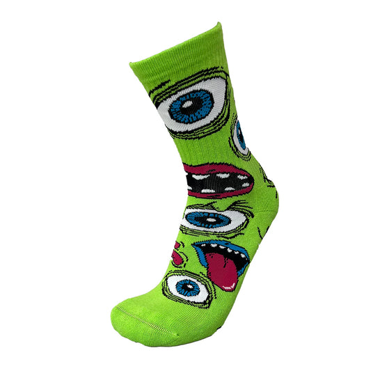 Green sock with colorful eye designs on a white background