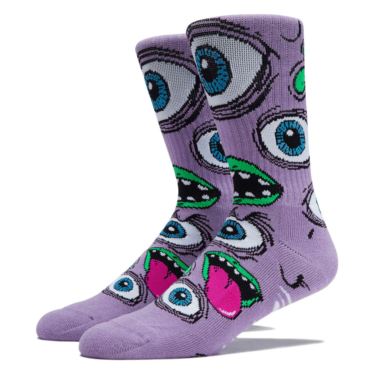 A pair of purple crew socks featuring a repeating cartoon monster-eye pattern with blue, green, black, white, and pink details, shown on a plain white background.