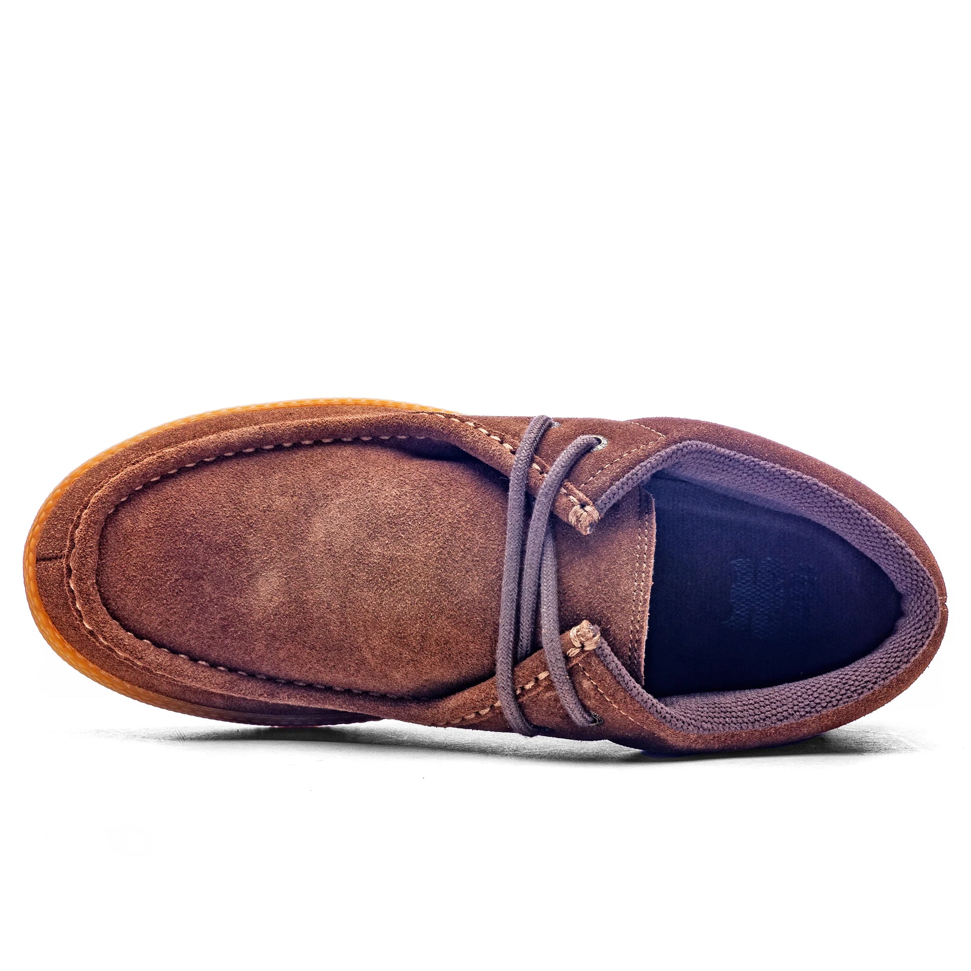 Brown suede shoe with a white background