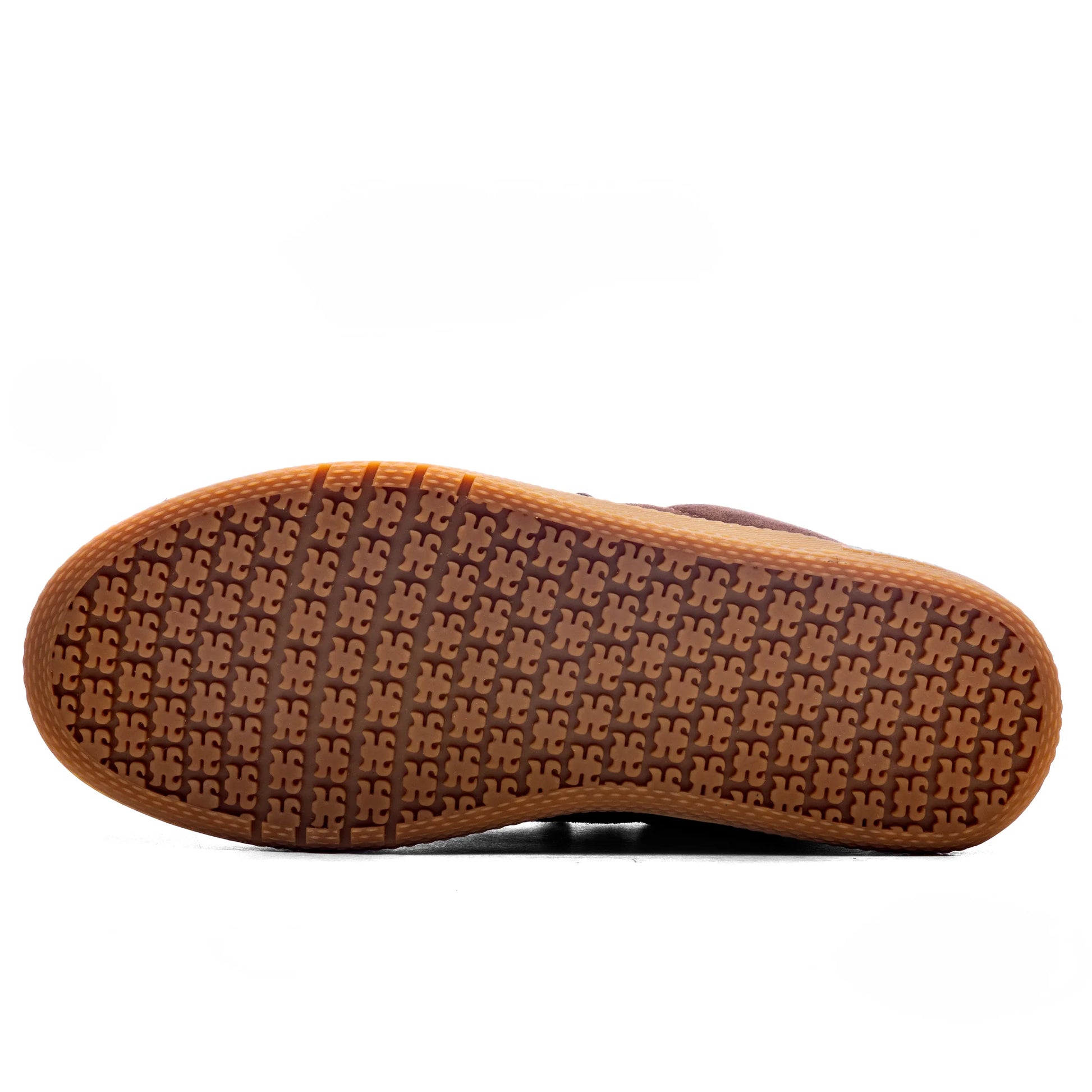 Brown shoe sole with tread pattern on a white background