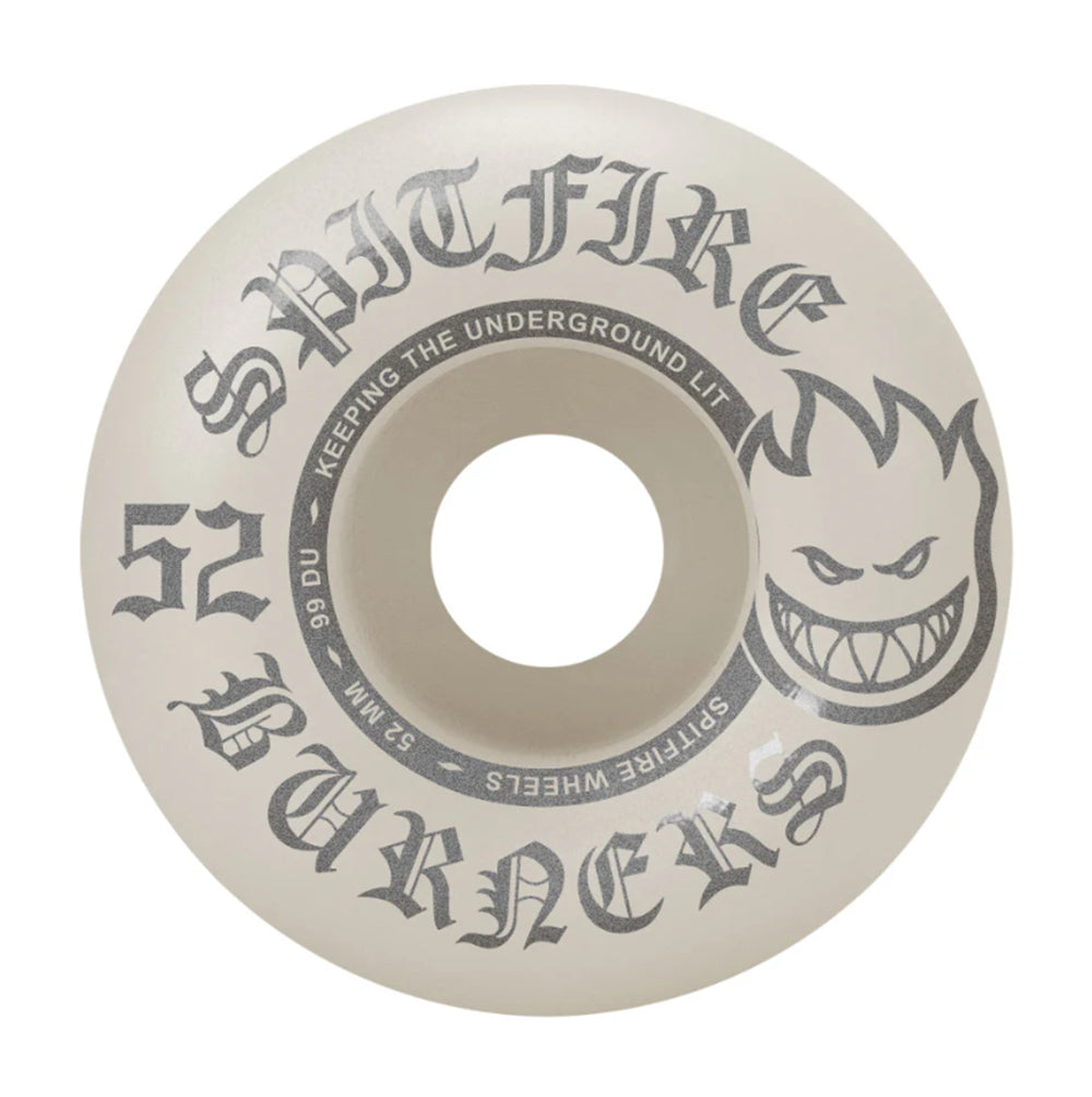 A single Spitfire Wheels skateboard wheel in a warm off-white/cream color, featuring the classic gray Spitfire logo and text on a clean white background.