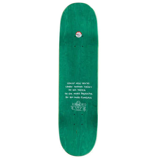 A green skateboard deck shown from the underside against a plain white background, featuring white handwritten-style text and a small red-and-white sticker near the nose.