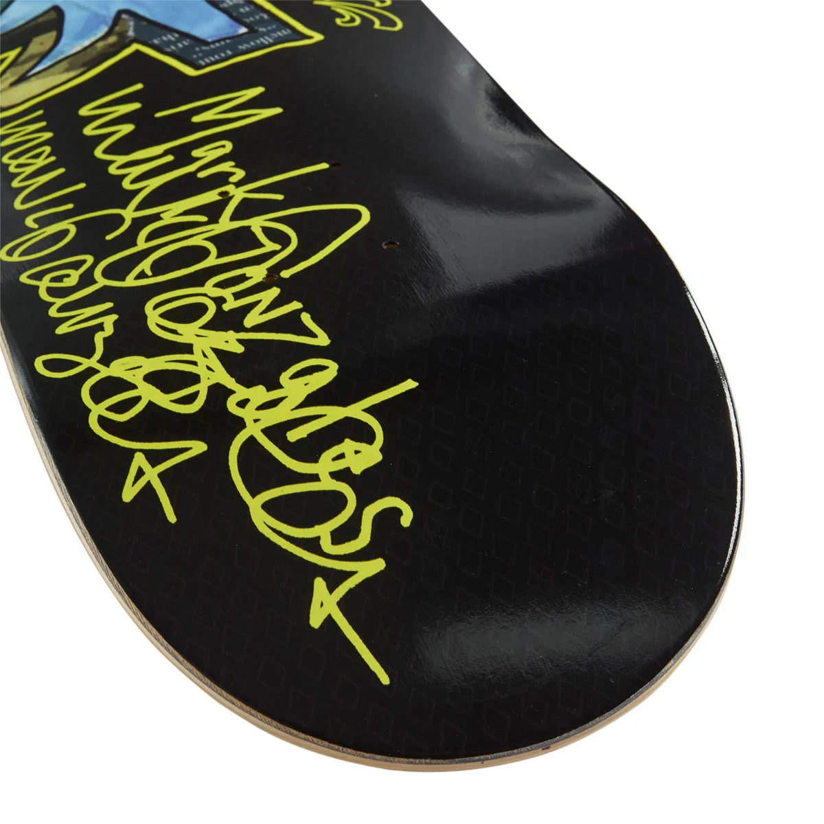 Close-up of a skateboard deck underside with a glossy black finish, bright yellow graffiti-style script, and part of a blue graphic near the nose.