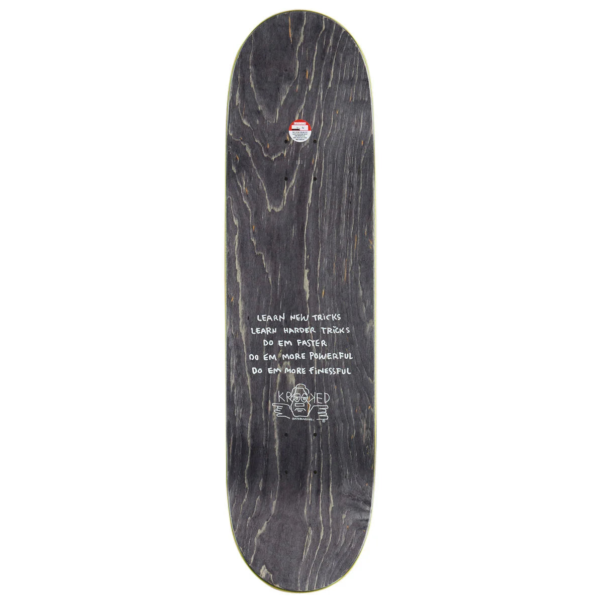 A skateboard deck shown from the underside, featuring a dark wood grain pattern in black and dark brown tones with white handwritten text and a small red, white, and blue logo near the top edge.