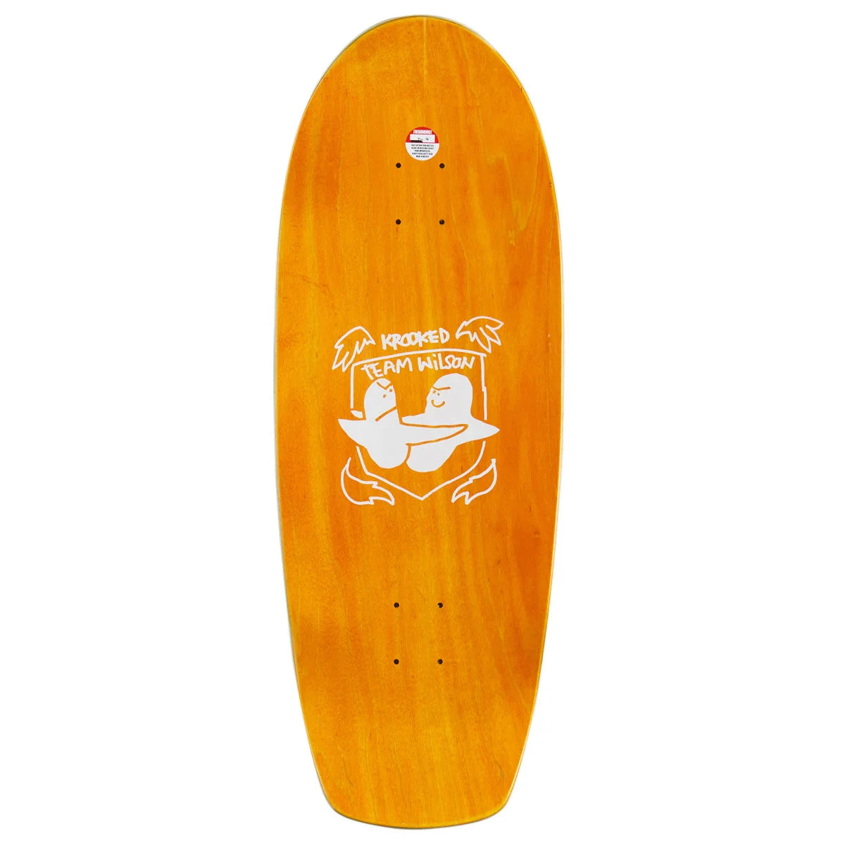 An orange wood deck skateboard shown from the bottom side, featuring a white graphic of two ducks with the text 'kROOKED TEAM wilson' on a clean white background.