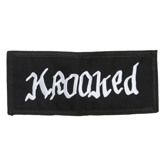 A rectangular black fabric patch with the word 'krooked' embroidered in a stylized white gothic font, shown on a plain white background.