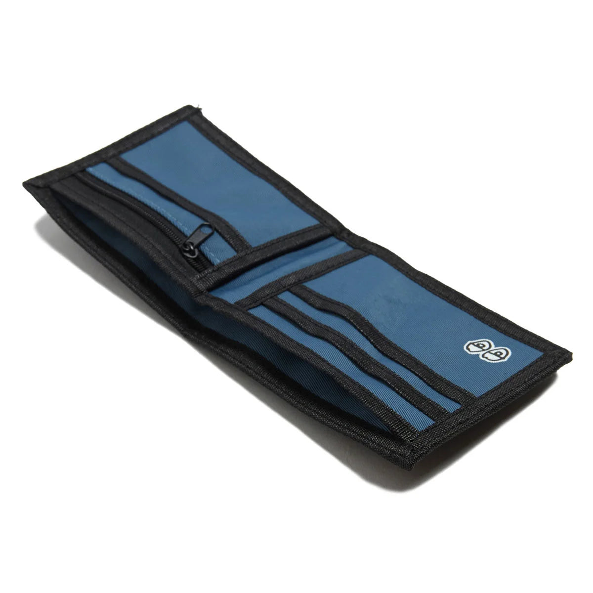 A blue and black fold-over wallet shown open on a white background, featuring card slots, a zip pocket, and a small circular logo on the lower right.