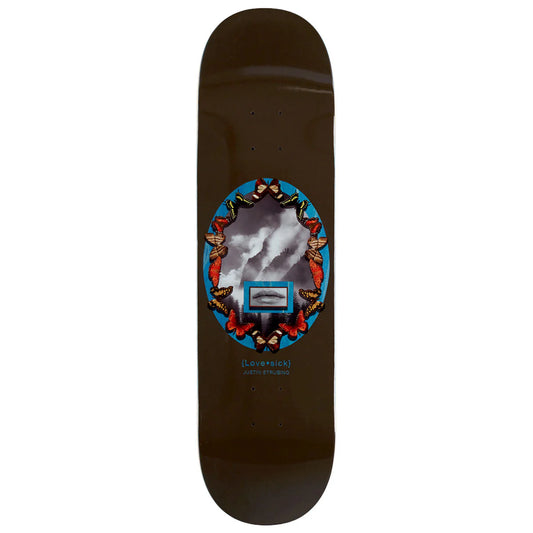 Skateboard deck with butterfly design on a white background