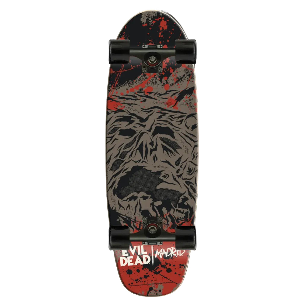 A 9-inch skateboard deck featuring a stylized skull graphic in black and gray over a red splatter background, with black wheels and trucks. The tail of the deck reads 'EVIL DEAD!' and 'MADRID' in white text.