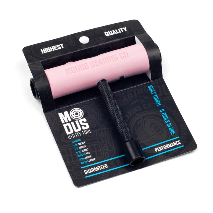 Pink roller tool with black packaging featuring Modus branding on a white background