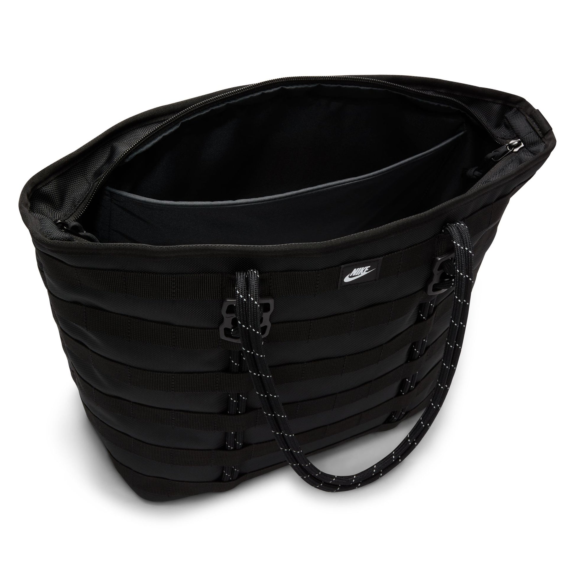 Black tote bag with a visible brand logo on a white background