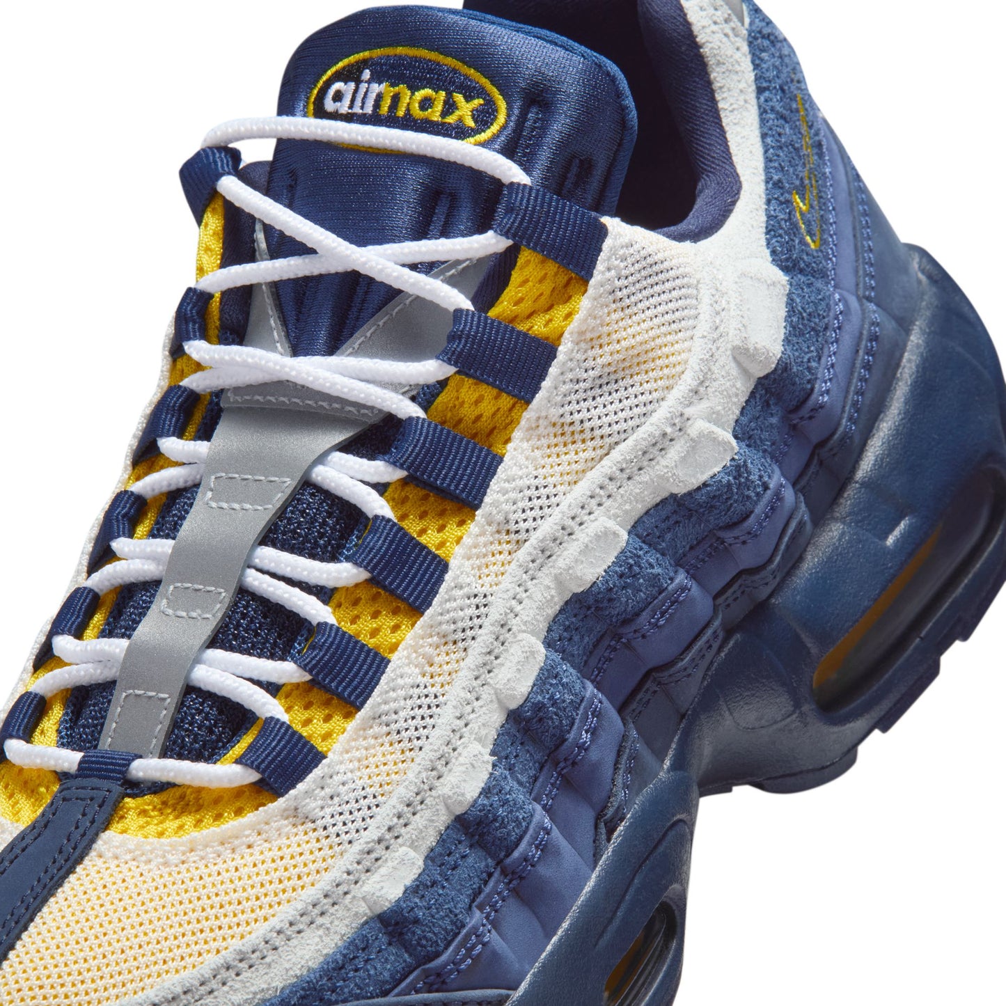 Blue and yellow sneaker with 'air max' branding on a white background