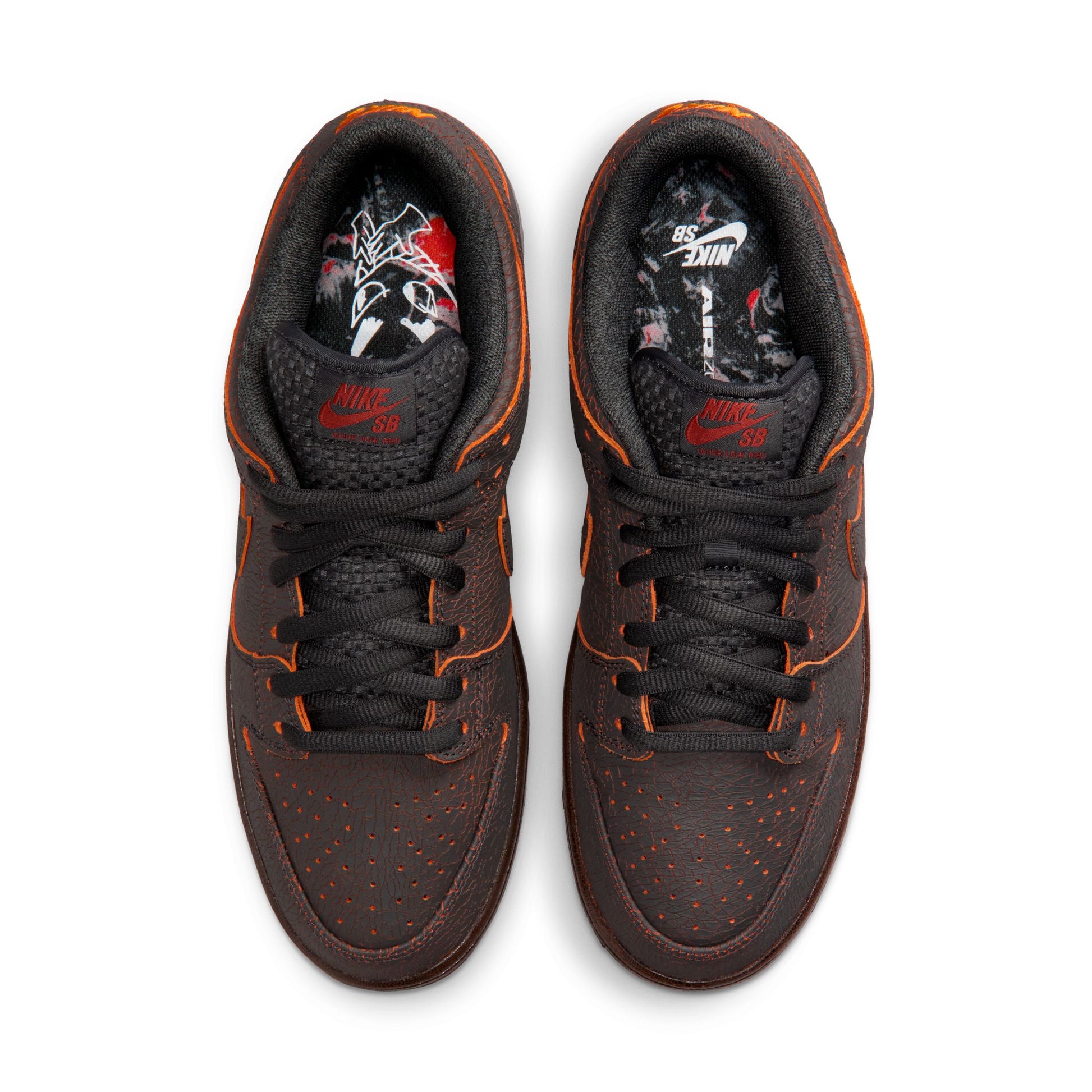 brown sneakers with orange accents on a white background