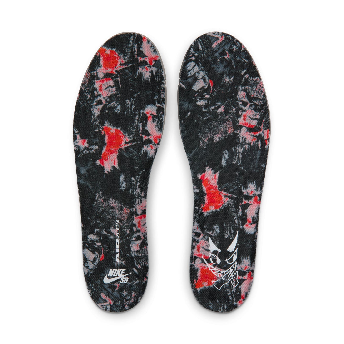 Pair of Nike SB branded shoe insoles with abstract design on a white background