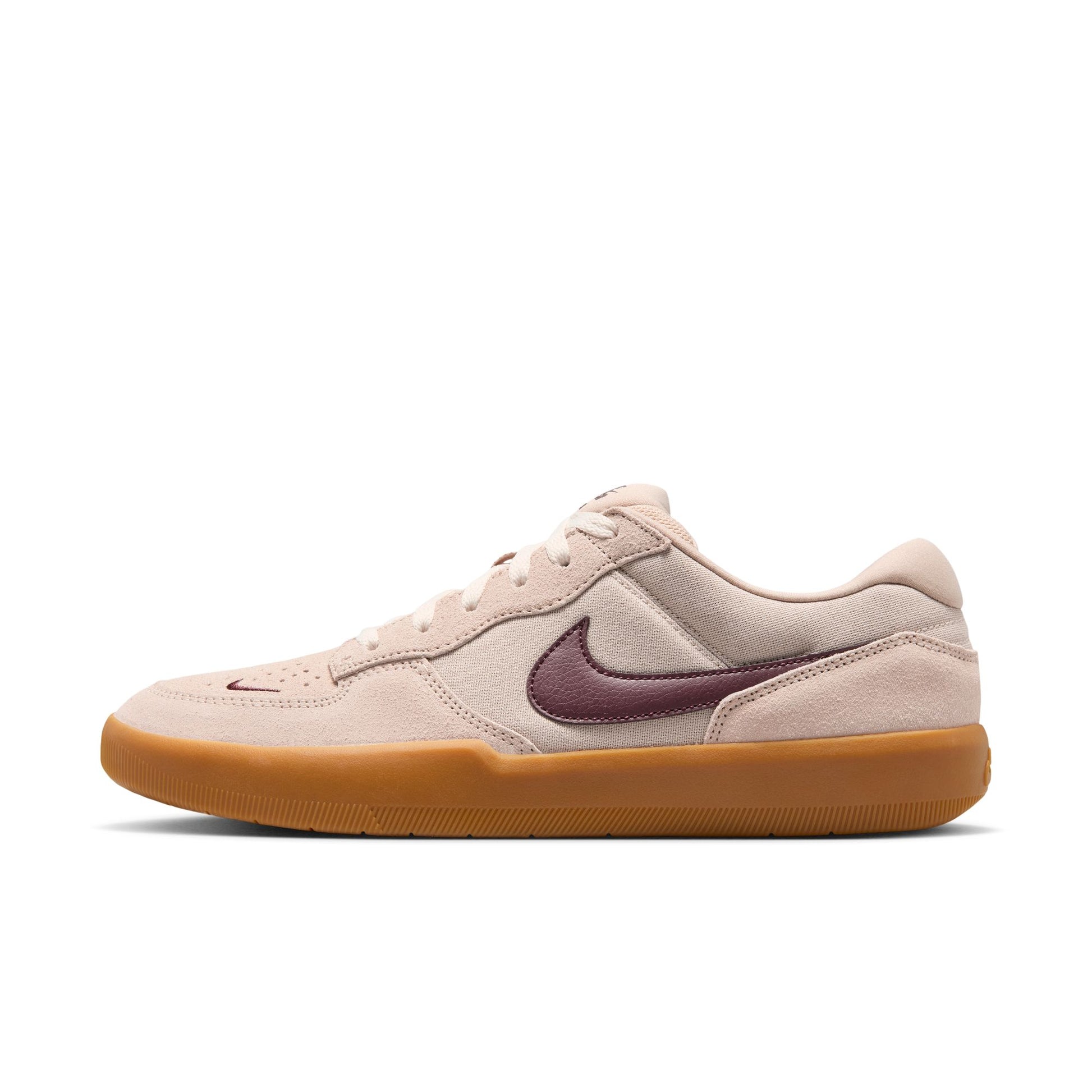 Beige sneaker with a maroon swoosh logo on a white background