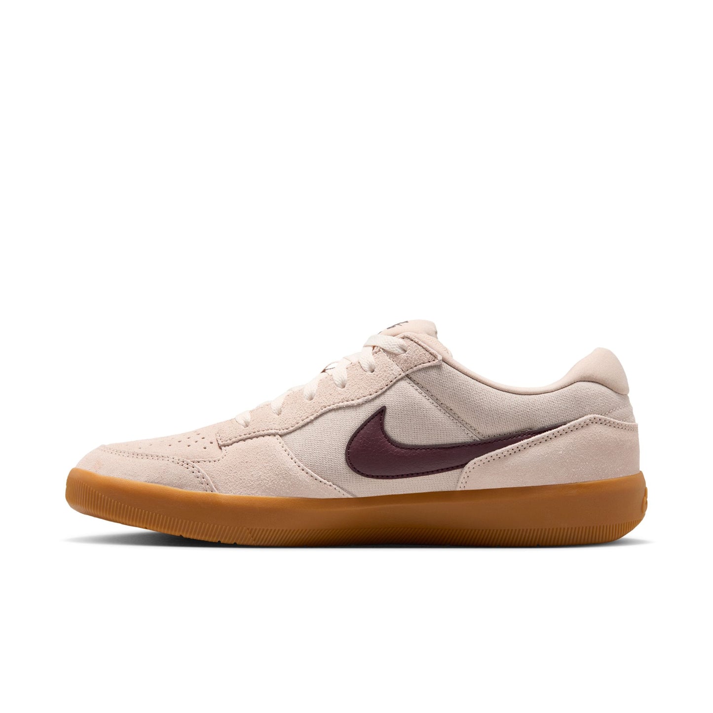 Beige sneaker with a maroon swoosh logo on a white background
