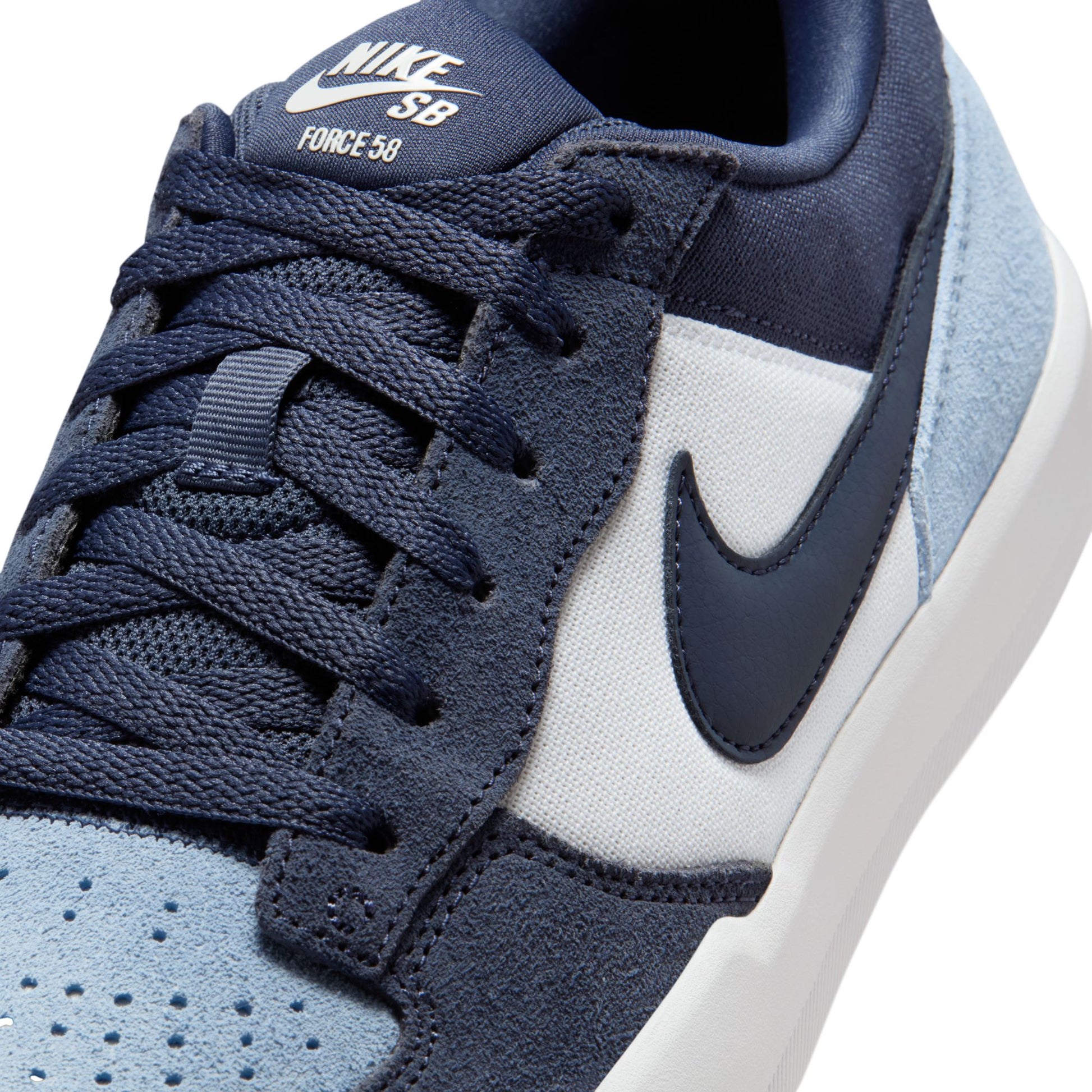 Blue and gray sneaker with Nike logo on a white background