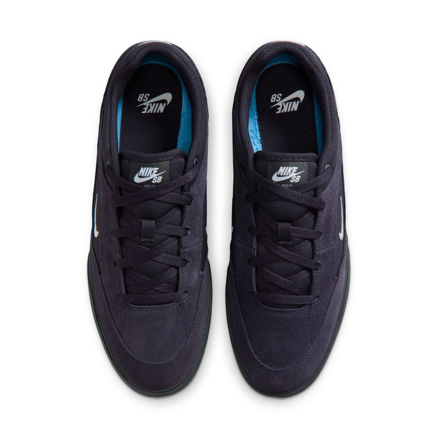 Pair of navy blue Nike sneakers on a white background
